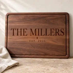 Large family-name engraving: Classic serif · diamond divider on Walnut.